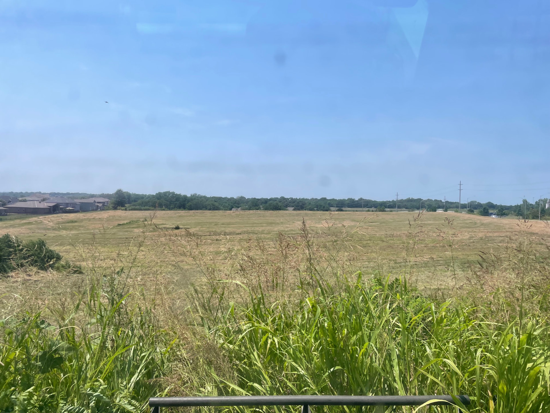 Cleared acreage with open ground and improved visibility across the property